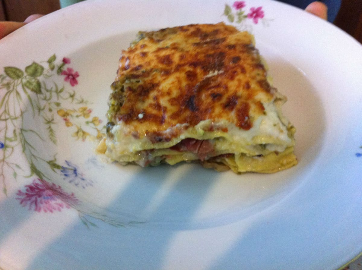 Lasagne con pesto di zucchine, speck e scamorza